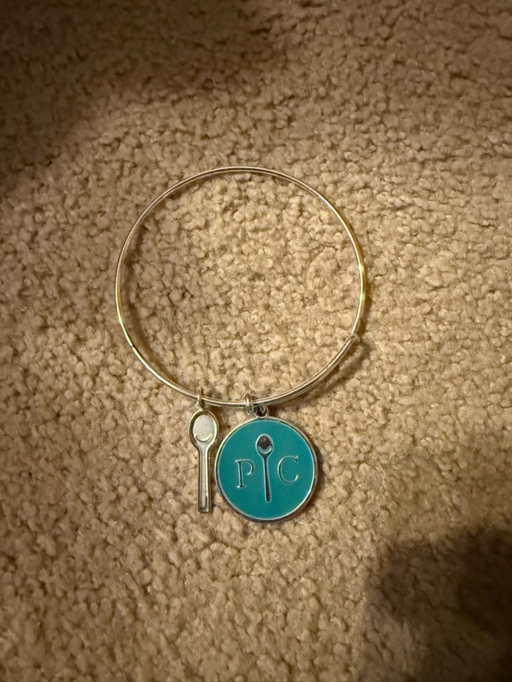 Silver colored Bangle Bracelet with Turquoise Round Charm and Spoon Accent